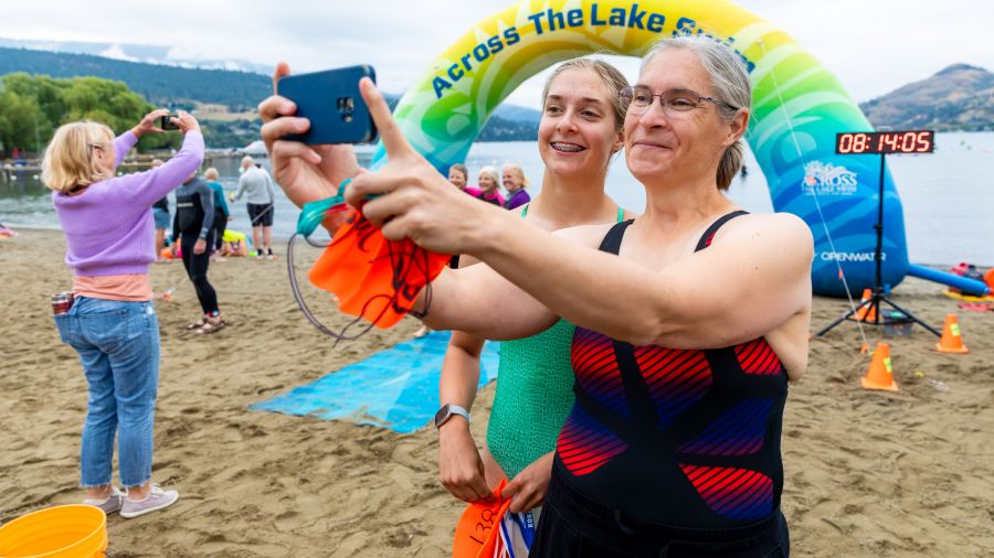 <who>Photo Credit: NowMedia/Gord Goble</who> Scene from 2024 Across the Lake Swim: Kalamalka Lake