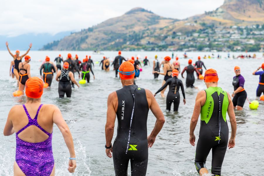 <who>Photo Credit: NowMedia/Gord Goble</who> Scene from 2024 Across the Lake Swim: Kalamalka Lake
