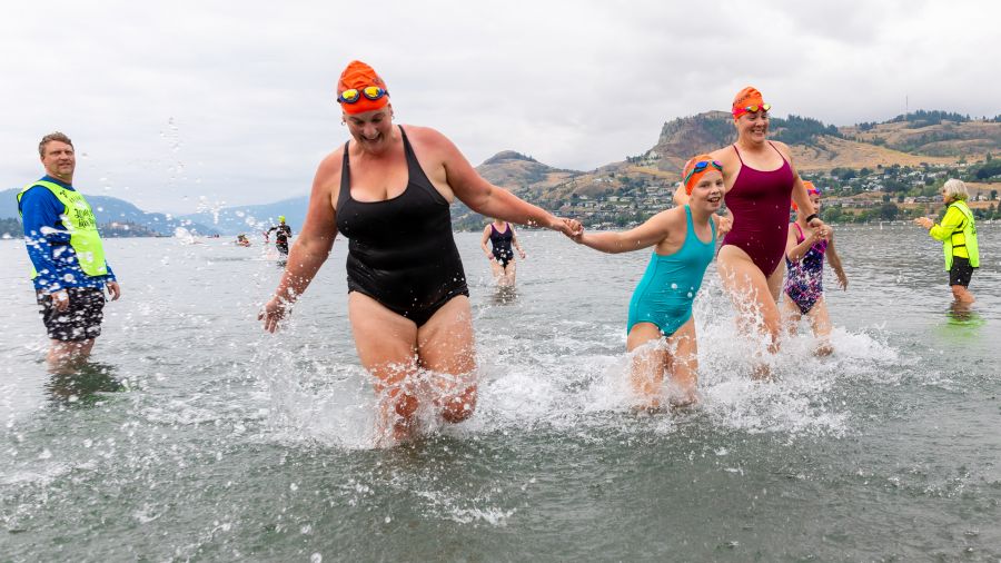 <who>Photo Credit: NowMedia/Gord Goble</who> Scene from 2024 Across the Lake Swim: Kalamalka Lake