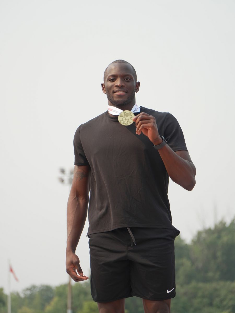 <who> Photo Credit: Athletics Canada/@archivekaze