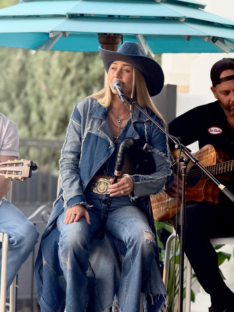 <who>Photo credits: Steve MacNaull/NowMedia Group</who>Alli Walker sang 'I Saw the Devil' at Thursday night's Fender Guitar Showcase at King Taps.