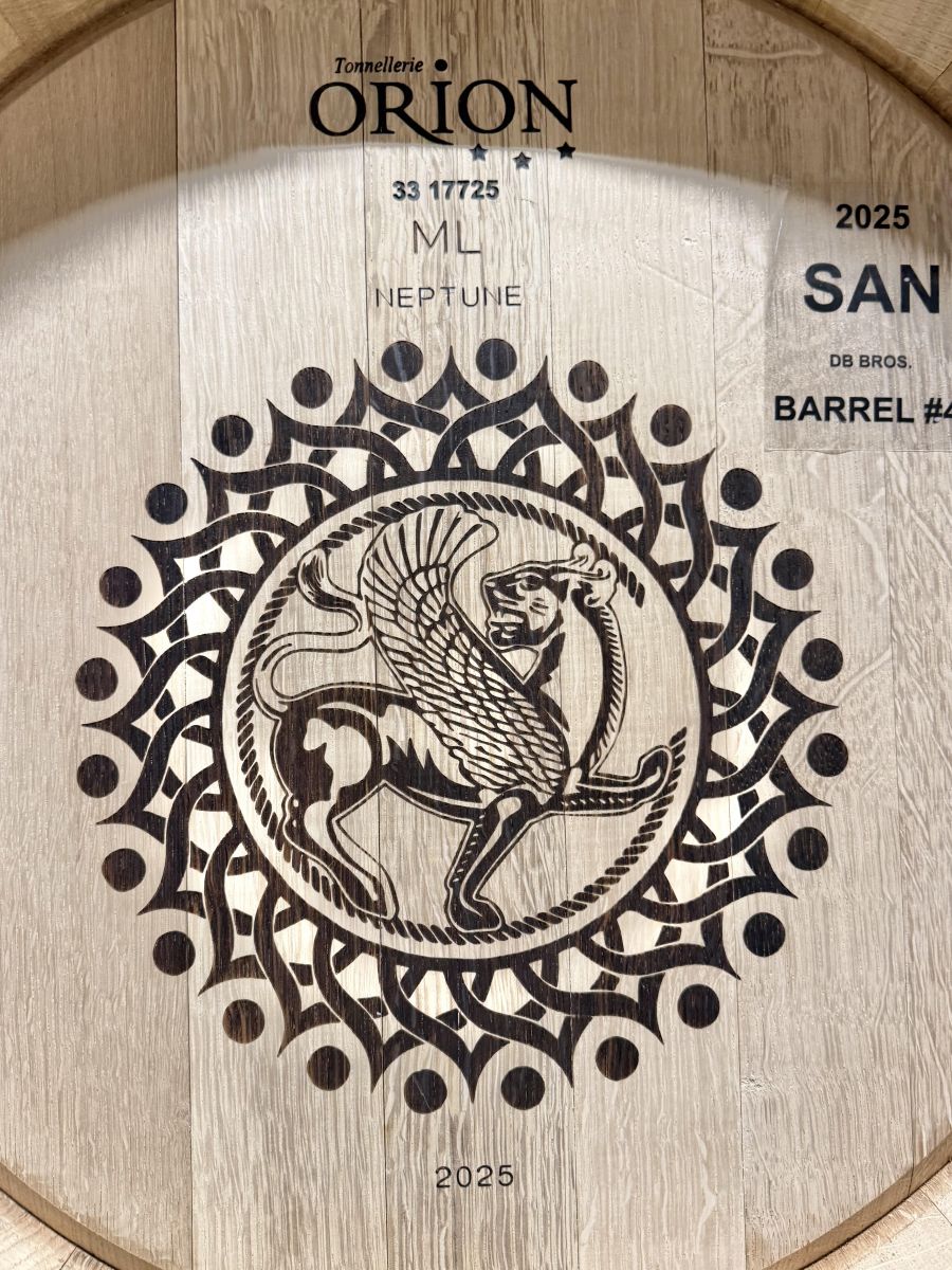 </who>The griffin logo on a barrel.