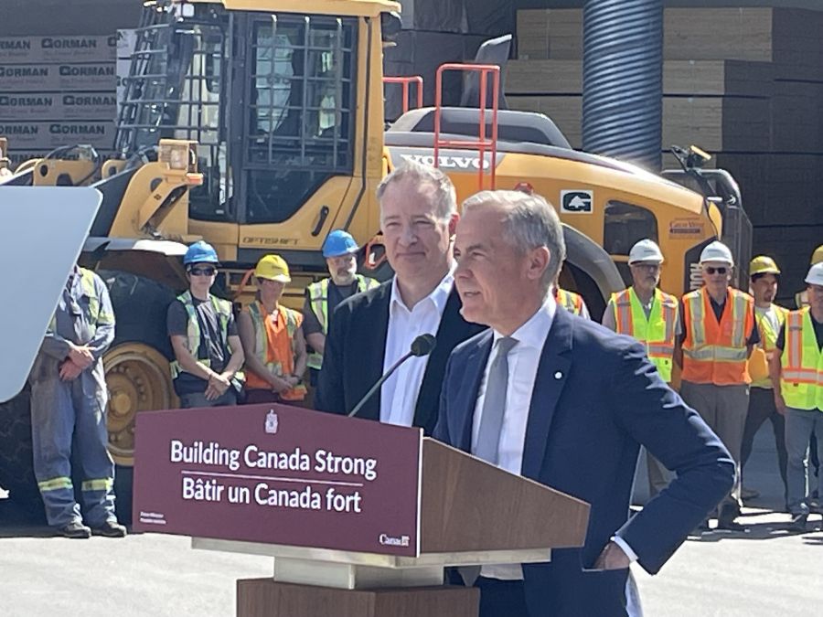 </who>Photo credit: Steve MacNaull/NowMedia Group</who>Prime Minister Mark Carney, right, with Liberal Kelowna MP Stephen Fuhr, answered a question about Bill C-18 hurting local media on Tuesday at Gorman Brothers Lumbers in West Kelowna.