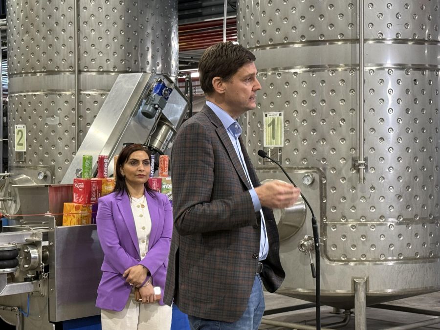 </who>However, Eby had no definitive answers. In the background is Vernon-Lumby NDP MLA Harwinder Sandhu.