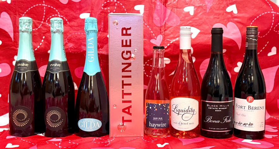 </who>Say 'I love you' with any one of these eight wines. From left, Evolve 2027 Libre Brut ($35), Evolve 2018 Libre Brut ($35), Gilda Gran Cuvée Blanc de Blancs Extra Dry Millesimato ($14), Taittinger Rose Prestige Champagne ($100), Haywire Baby Bub Sparkling Rose ($19 for 375 ml bottle), Black HIlls 2024 Bona Fide Hiatus Collection ($35) and Fort Berens 2024 Lillooet Pinot Noir ($35).