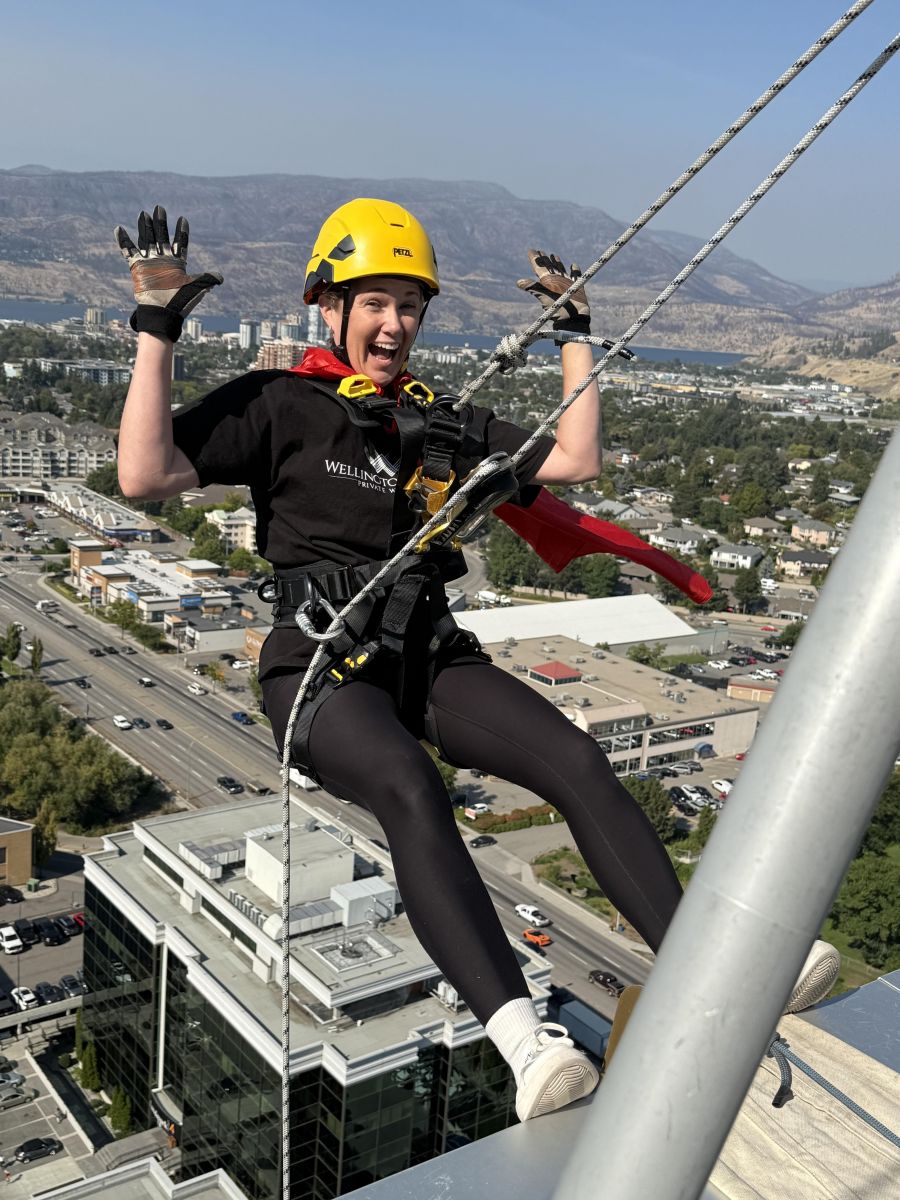 </who>Joanna Penich gets psyched to rappel from the roof of the 23-storey Landmark 7 office tower.