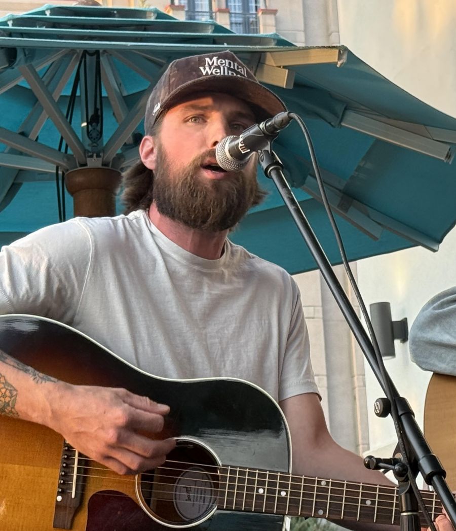 </who>Mitch Zorn from Nakusp sang his first single 'Home'.