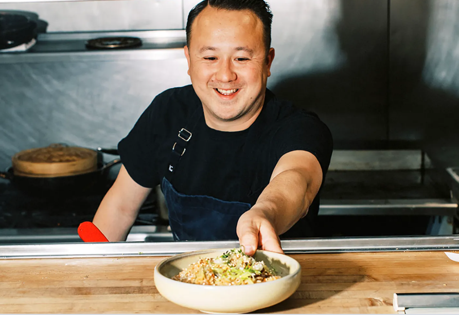 </who>The Eater.com writer praised Kin & Folk co-founder Zachary Chan, above, and his soy chicken, below.