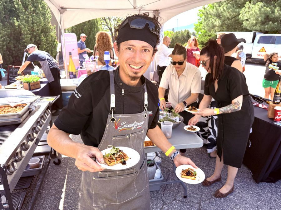 </who>Shawn Cheer, a chef at the Sweetgrass restaurant at Nk'Mip Winery in Osoyoos was at Pig Out serving cornbread waffles topped with braised duck (below).