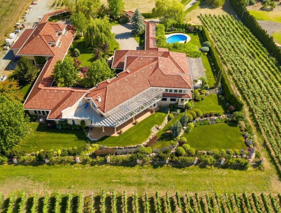 </who> Aerial shots of the mansion, above, and the whole 11-acre property, below.