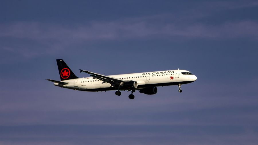 <who>Photo credit: Adam Khan and Justin Hu on Unsplash</who>Both Air Canada, above, and WestJet are putting up raffle prizes of two free round-trip tickets anywhere they fly from Kelowna airport.