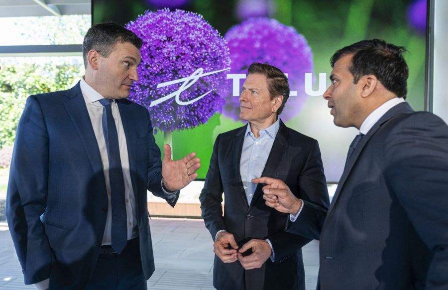 <who>Photo Credit: Rich Lam/Canadian Press via LJI</who>Evan Solomon, Minister of Artificial Intelligence and Digital Innovation (left), speaks with Darren Entwistle, President and CEO of TELUS (centre) and MP Taleeb Noormohamed after plans for three large-scale AI data centre project in British Columbia during a press event in Vancouver on Monday, May 11, 2026.