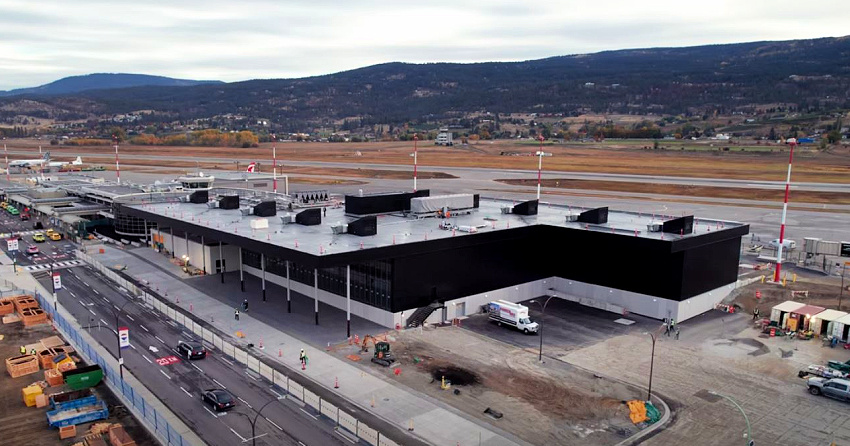 </who>An aerial shot showing the expanded terminal that will house the twice-as-big departure lounge and the twice-as-fast security screening area.