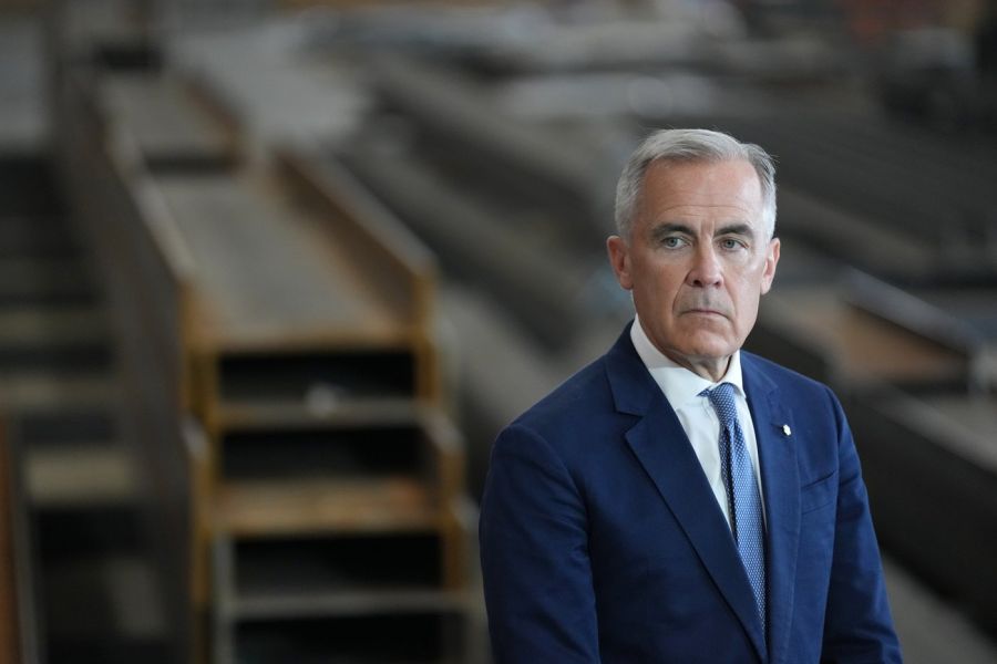 <who>Photo Credit: Canadian Press</who>Prime Minister Mark Carney