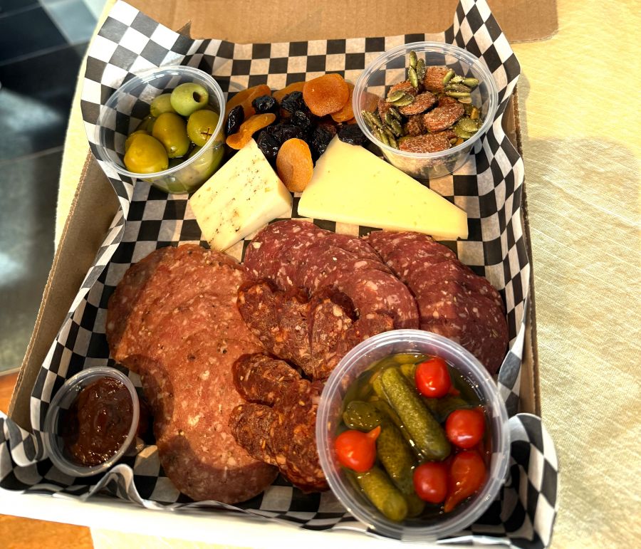 </who>The charcuterie comes in a pizza box for easy eat-in or take-out.
