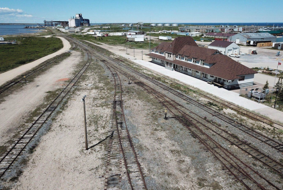 <who> Photo credit: Canadian Press </who> An aerial view of the rail line and Via station is shown in Churchill, Manitoba.