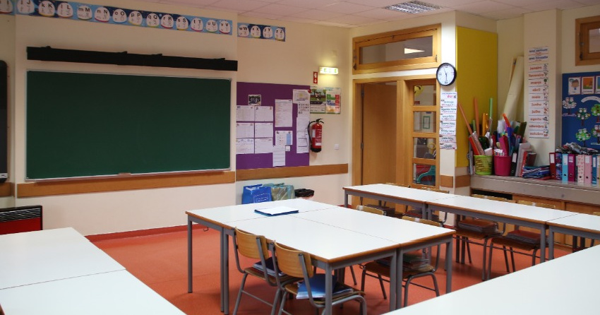 <who> Photo credit: 123RF </who> A file image showing a classroom.