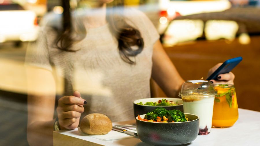 <who>Photo credit: Farhad Ibrahimzade on Unsplash</who>73% of Canadians are planning to dine solo in a restaurant in the next year.