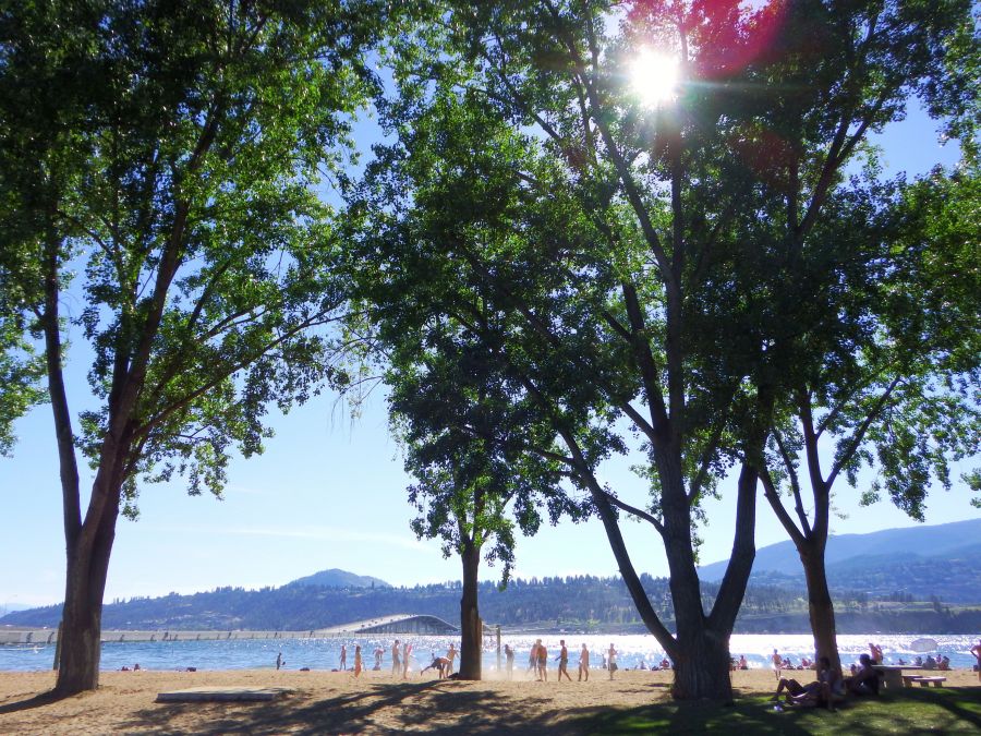 <who>Photo Credit: Tourism Kelowna</who>Hot Sands Beach in Kelowna's City Park is a popular summer spot for residents and tourists alike.