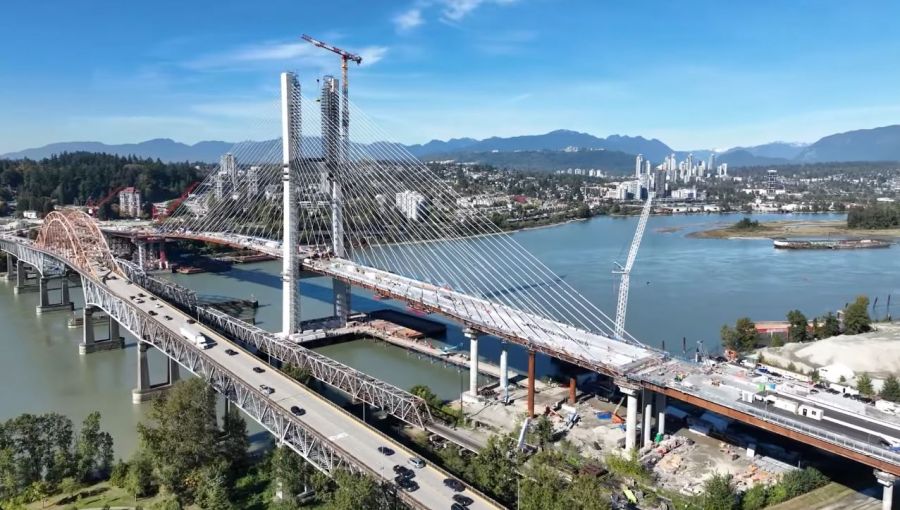 <who>Photo Credit: TI Corp YouTube video/October</who>The nearly complete stal̕əw̓asəm Bridge drawfs the soon-to-be-defunct Pattullo Bridge in this image from earlier in the fall.