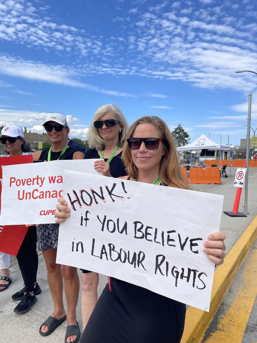 <who>Photo credits: Steve MacNaull/NowMedia Group</who>Air Canada flight attendant Jillian Fugedi was on the picket line outside Kelowna airport this afternoon and also acted as the spokesperson for the striking workers.