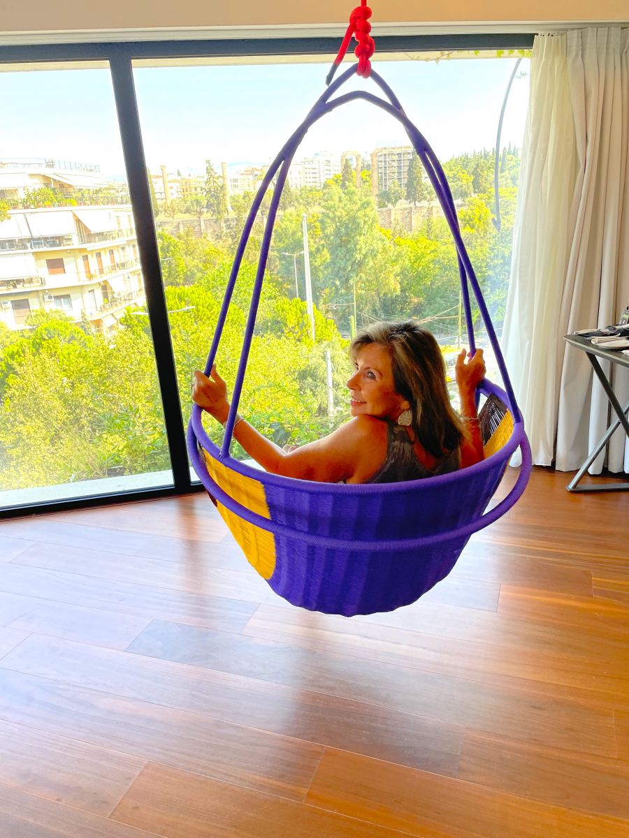 <who>Photo credit: Steve MacNaull/NowMedia Group</who>A swing chair in the deluxe suite is a whimsical touch.