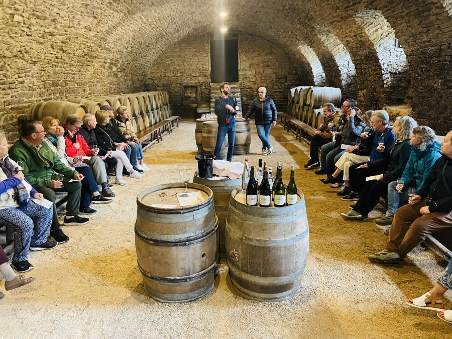 </who>The group tasting in the cellar at Chateau de Pierreclos.
