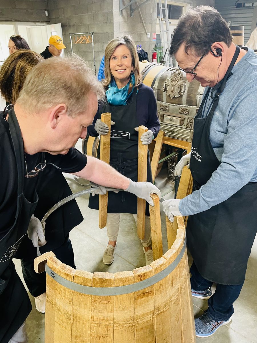 </who>Cruisers try to make a wine barrel at Art de Tonneau.