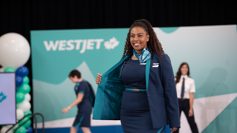 <who>Photo credits: WestJet</who>WestJet showed off its distinctive uniforms at at the APEX Expo's Professional Clothing Industry Association fashion show.