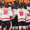 Hage scores OT winner as Canada avoids upset against Latvia