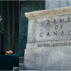 Bank of Canada holds key rate, warns of inflation risk