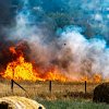Binoculars help police track down man accused of lighting Okanagan grass fires