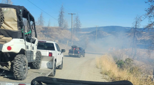 Wildfire near Traders Cove being held by crews