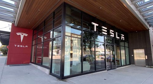 Man arrested after allegedly spray painting ‘obscenities’ on Vancouver Tesla dealership